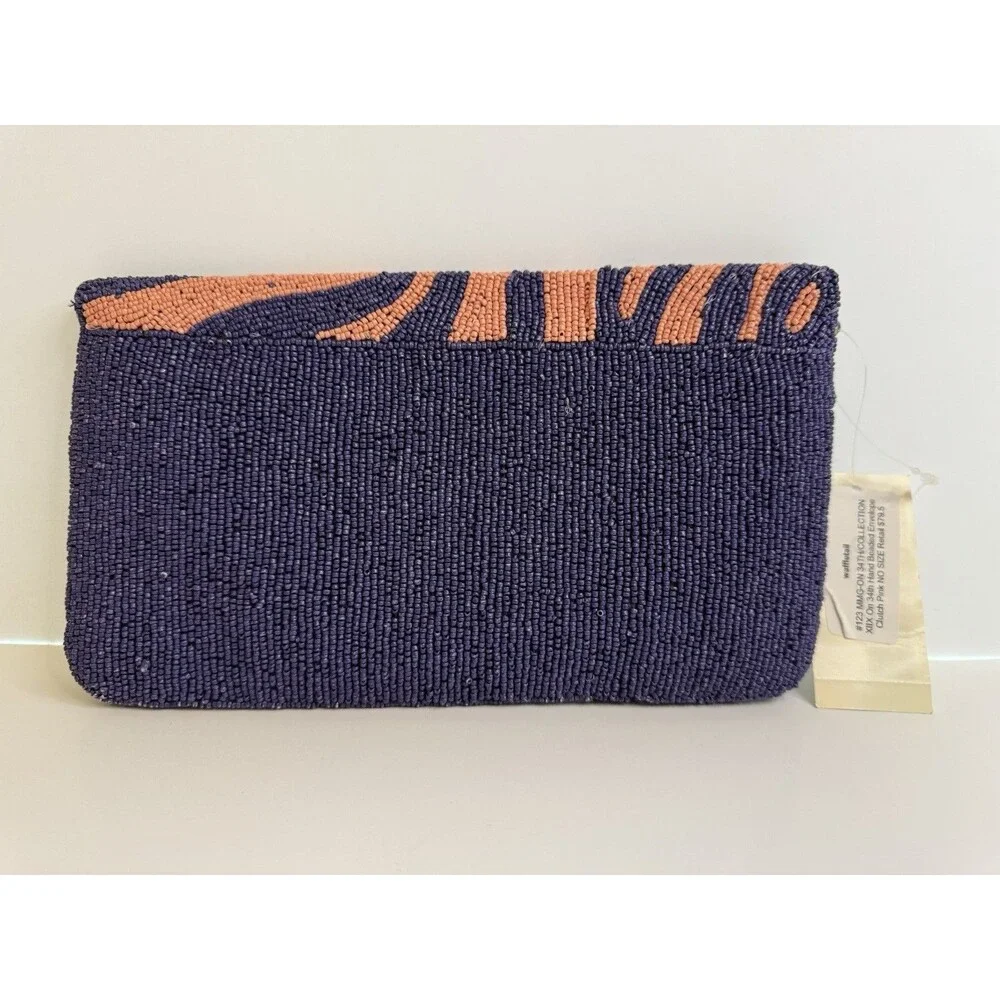 On 34th hand-beaded envelope clutch -navy and coral pink zebra stripe design